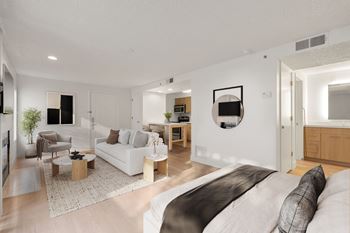 Bed with sofa and round table